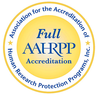 Association for the acrreditation of Human Research Protection Programs, Inc. Logo in yellow and blue colors within a circle