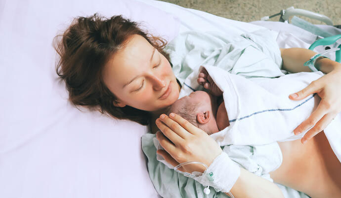 Mother holding newborn